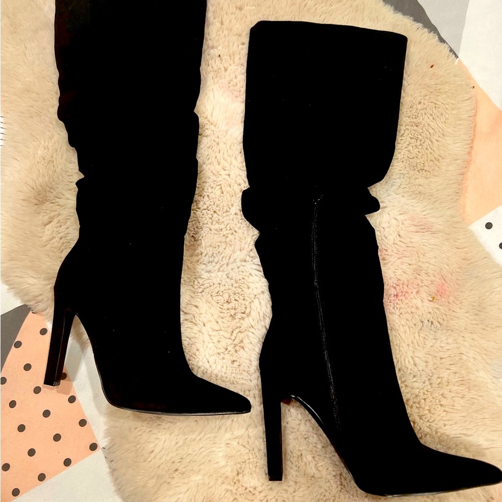 New never worn JustFab boots, size 8.5 heels 4inch.